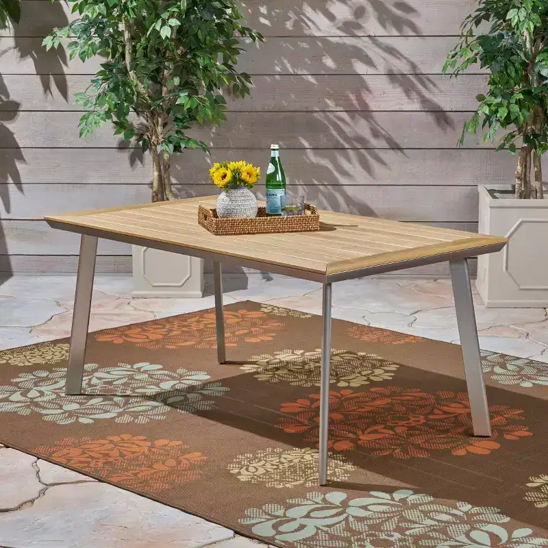 Christopher Knight Home Leeds Outdoor Aluminum and Faux Wood Dining Table with Splayed Leg