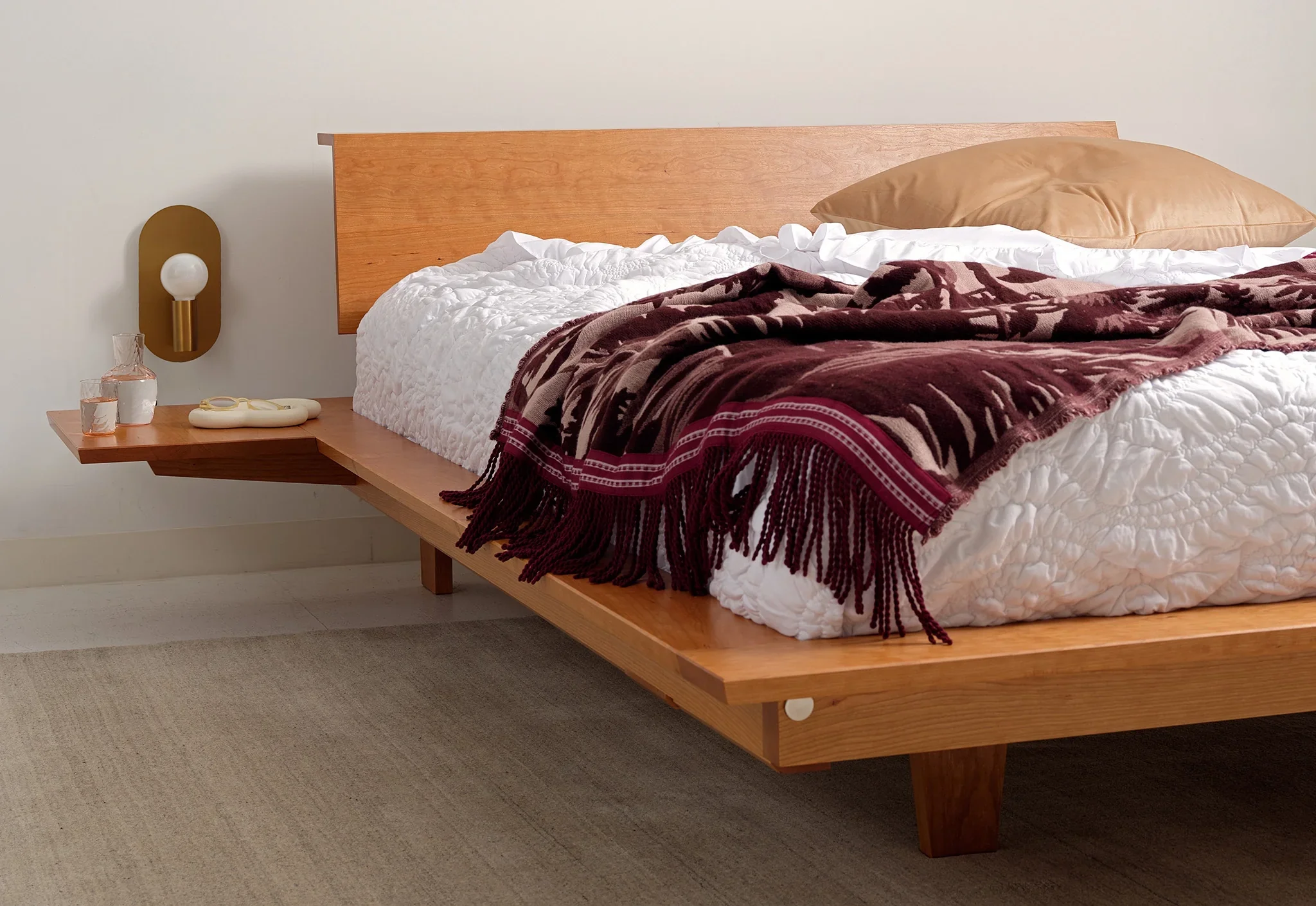 Platform Bed - The is minimalist to its core, stripping away pretense with its series of broad, surrounding surfaces